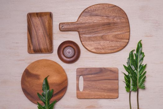 Set of wooden kitchenware on table