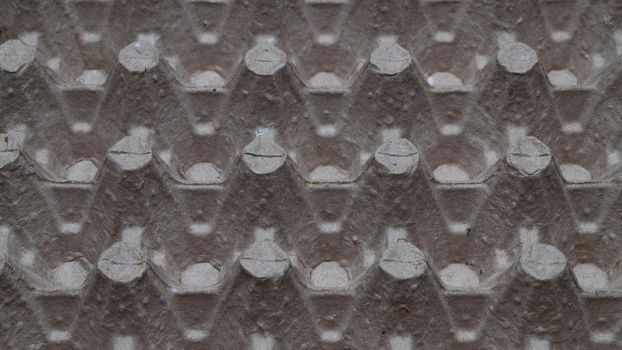 lattice from under the eggs close-up three-dimensional texture trapezoidal