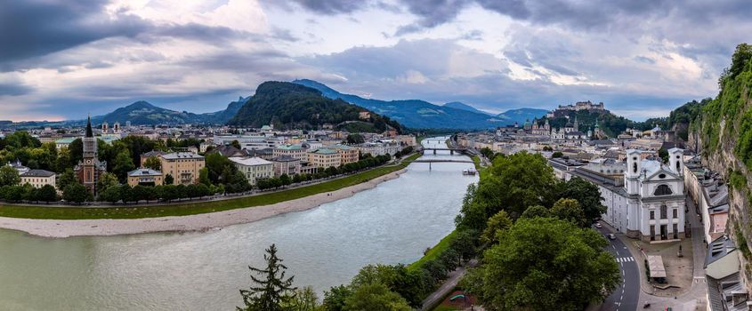 Beautiful view of the historic city of Salzburg with Festung Hohensalzburg in summer, Salzburger Land, Austria. Panoramic summer cityscape of Salzburg, Old City, birthplace of famed composer Mozart. 