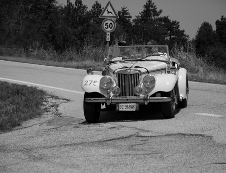 MG TF 1250 1953 on an old racing car in rally Mille Miglia 2022 the famous italian historical race (1927-1957
