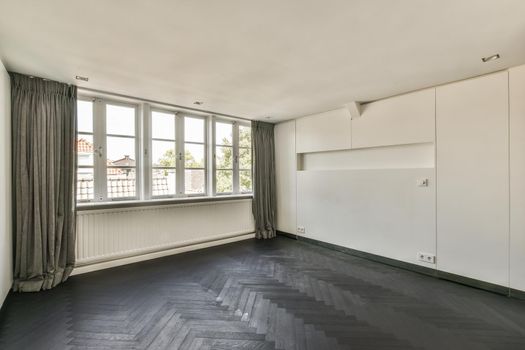 Empty room white windows, curtains and parquet floor