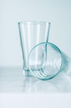Clean empty glasses on marble table