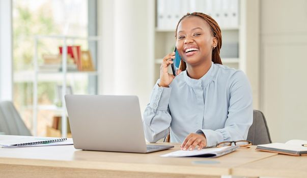 Computer working, phone communication and black woman worker multitask in a office. Happy corporate business employee with a smile using technology at work on a online mobile call at a company.