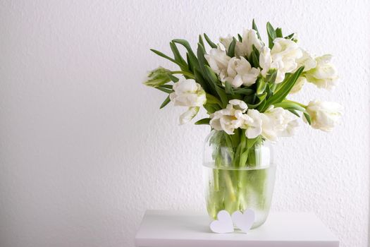 Bouquet of white tulips in a vase