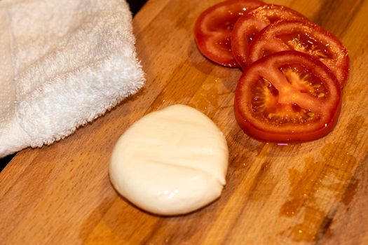 Food photography. Mozzarella cheese and tomatoes. Concept