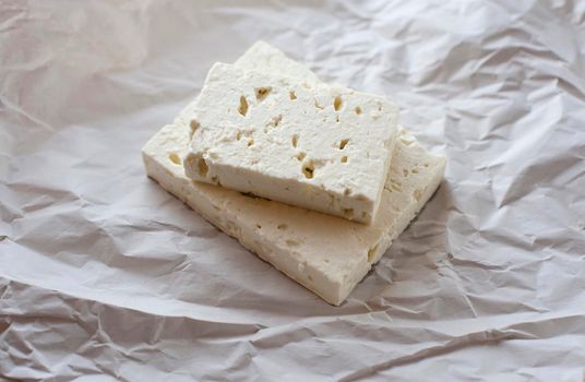 Portions of feta cheese