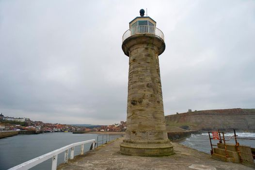 Navigation lighthouse on a pier