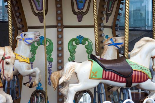 Colorful decorative horses on a carousel