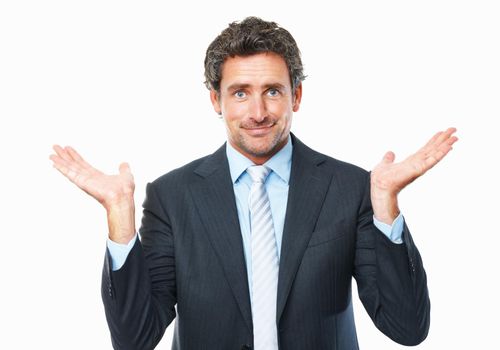 Confused business man. Confused business man standing with hands raised against white background