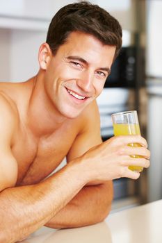 Building the perfect body with a healthy breakfast. a muscular man eating breakfast.