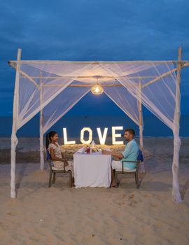Romantic dinner on beach of Huahin Thailand, dinner by candle light in Hua Hin ,Valentine concept