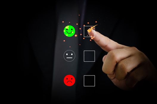 Business satisfaction survey customer service experience concept.Happy Businessman choose to rating checked box on Excellent Smiley Face Rating for a Satisfaction Survey.