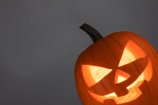 Halloween pumpkin on gray