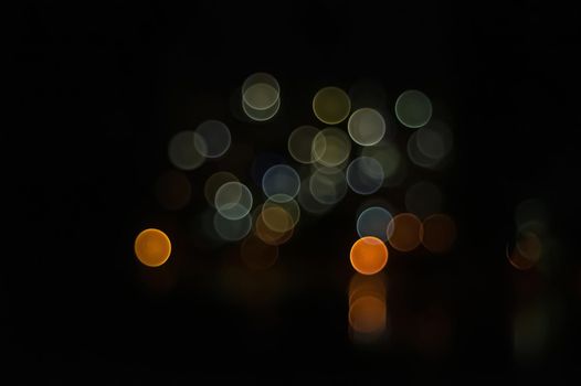Blured night light. bokeh background, Blur concept . Abstract unfocused blured bokeh light dots background . Defocused christmas lights background . Abstract Lights. Unfocused Light background.