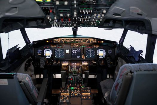 Empty airplane cockpit used by captain and copilot to fly