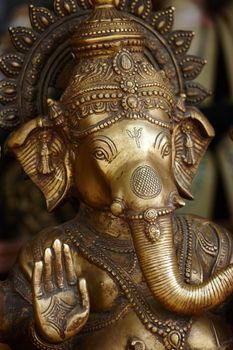 Ganesha in all his brilliance. Closeup of a bronze idol of the Hindu god Ganesha in an Indian temple.