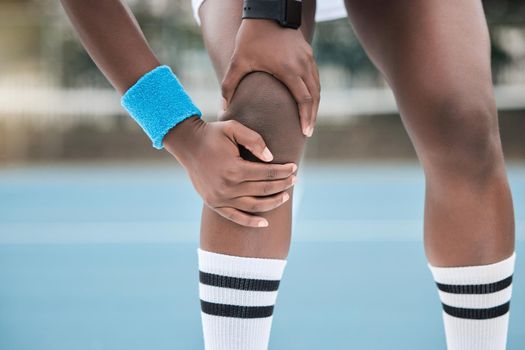 Pain, injury and knee problem with man athlete suffering from leg discomfort during exercise or training. Professional sport male with medical emergency, joint and muscle issue while playing match