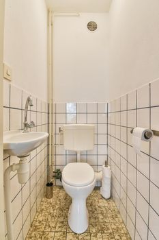 Simple toilet with small sink