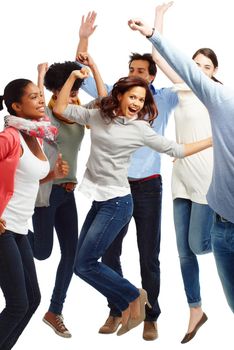 Jumping for joy. Group of casually dressed young adults jumping excitedly against a white background.