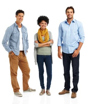 Young and casual. Portrait of three young adults standing on a white background.