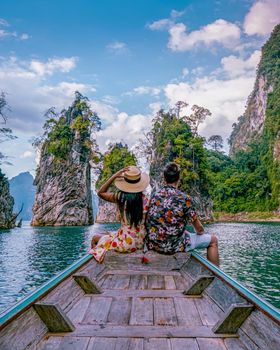 couple on longtail boat visiting Khao Sok national park in Phangnga Thailand, Khao Sok National Park