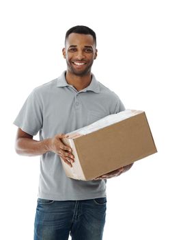 Its for you. A smiling deliveryman holding a box while isolated on white.