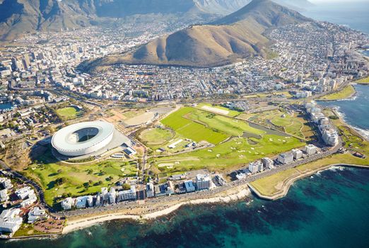 City and nature. Aerial shot of the city of Cape Town and the stadium.