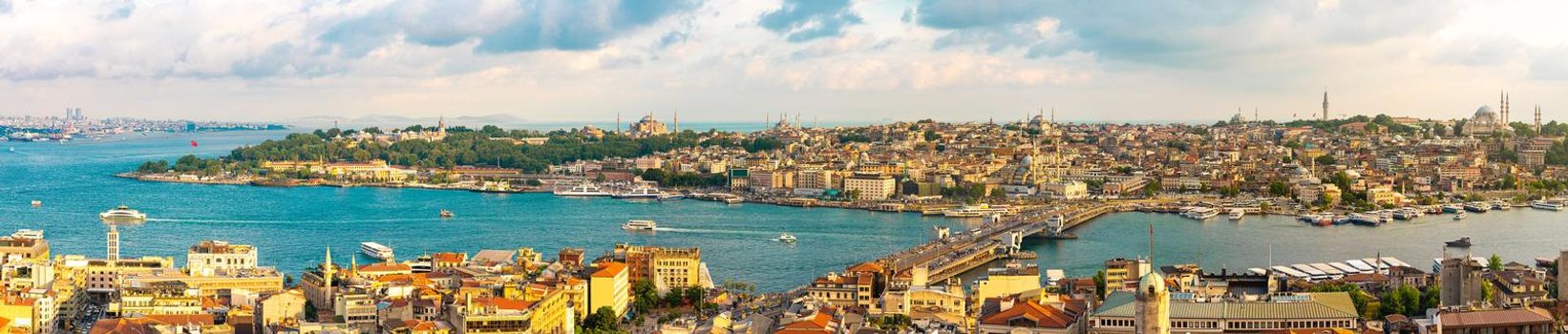 Panoramic view of Istanbul skyline with Golden Horn strait at sunset