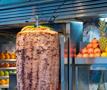 Kebab is a large piece of meat when cooking in the kitchen. Close-up
