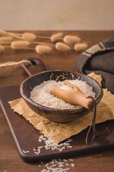 Long grain rice on rustic countertop