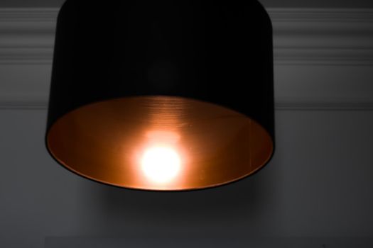 Bronze lamp in a room, elegant modern home decor lighting