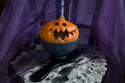 Halloween Pumpkin head, pumpkin with teeth and eyes, selective focus,