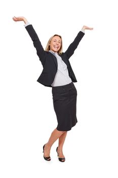 Celebrating her success. Studio portrait of an excited businesswoman standing with her arms outstretched against a white background.