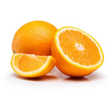 The juicy details about vitamin C. Studio shot of juicy oranges against a white background.