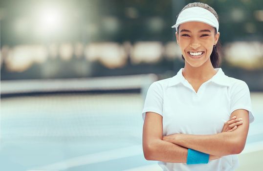 Tennis, sport and fitness with a sports woman on a court with her arms crossed outside for health and wellness. Training, exercise and fitness with a young female player ready for a game or match.