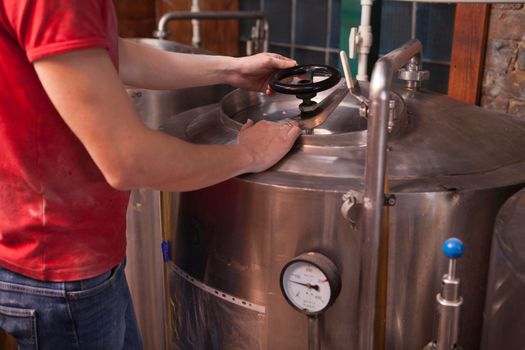 Professional brewer making craft beer