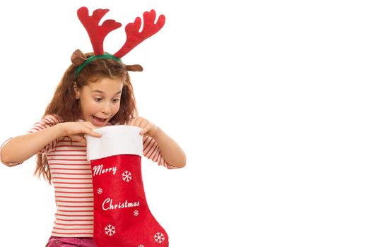 Young girl with a Christmas stocking