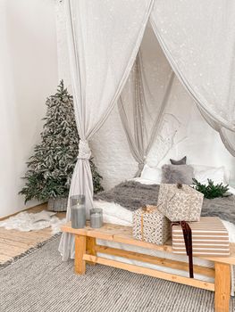 Christmas stylish morning bedroom with fir tree