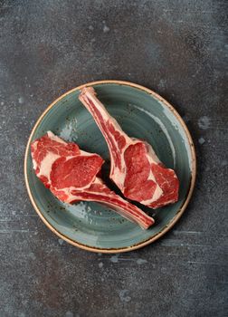 Raw marbled meat steaks