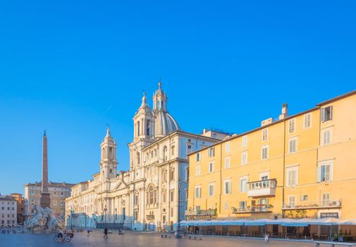 ROME, ITALY - CIRCA AUGUST 2020: Sunrise light on Piazza Navona (Navona Square) buildings