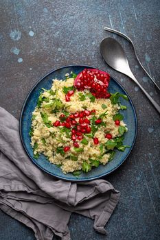 Tabbouleh salad with couscous and pomegranate