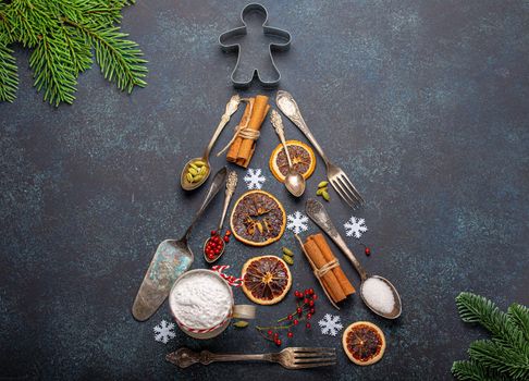Christmas tree from kitchen tools and baking ingredients