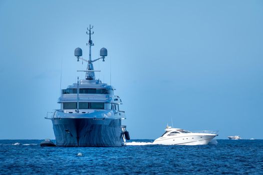 Grey yacht anchored in Formentera