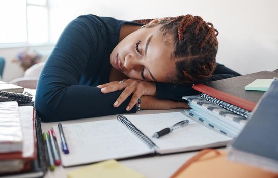 Burnout, sleeping student at desk with books while studying, reading or university education knowledge in room. Tired fatigue gen z black woman in home office with notebook for scholarship learning