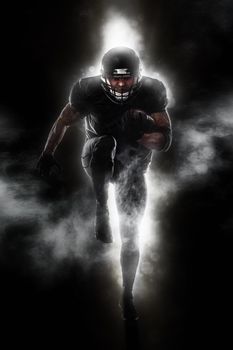 American football sportsman player running. Sport moution concept.