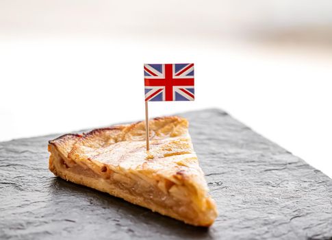 United Kingdom, dessert and bakery, slice of apple tart with British flag