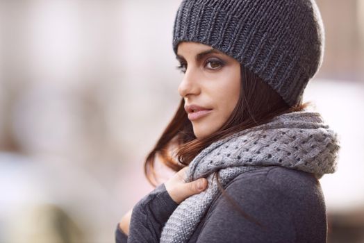 Hello winter. a beautiful young woman wearing stylish winter clothing.