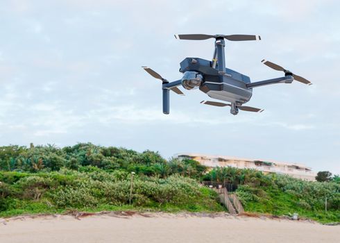 The high-tech drone flying in the sky. Drone with professional camera takes pictures. Copter with high resolution digital camera. Modern technology. 3d rendering.