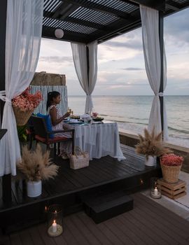 Dinner by candle light on the beach in Thailand