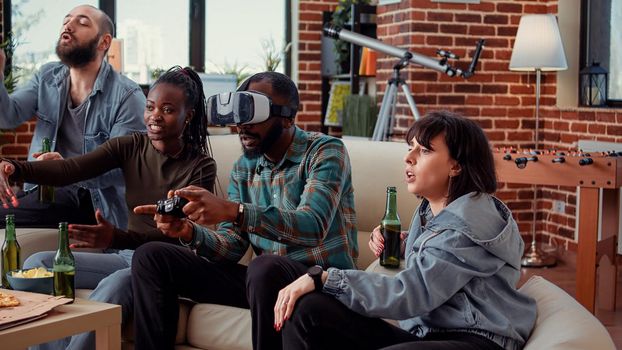 Group of people celebrating video games win with vr glasses